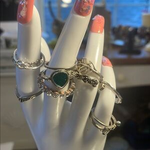 Rings 14 stackable Silvertone various sizes and several are adjustable